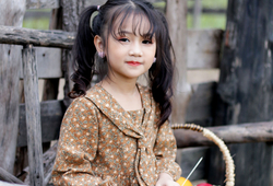 Váy hoa nâu cổ nơ