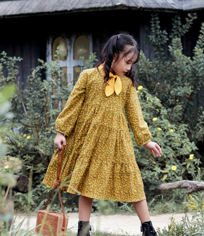 Váy hoa vàng cổ nơ lệch