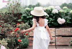 Váy trắng nơ lưng, phối ngực thêu