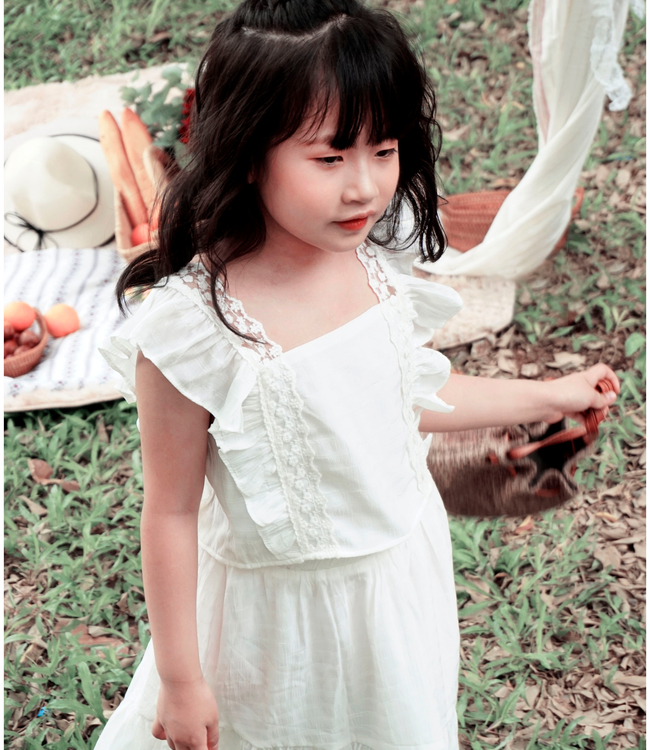 Set chân váy trắng + áo phối ren