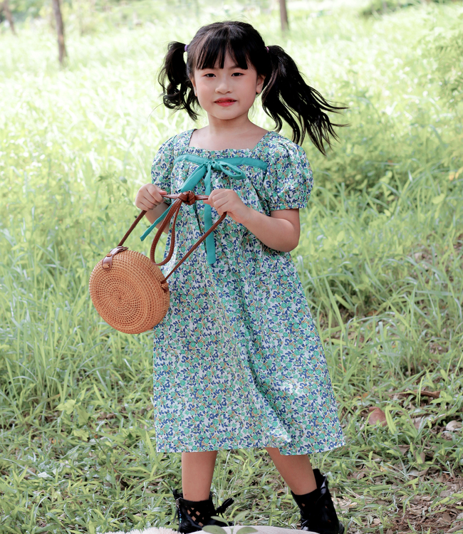 Váy hoa xanh nơ ngực