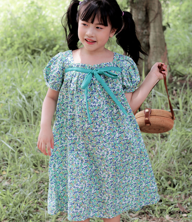 Váy hoa xanh nơ ngực