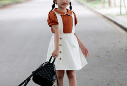 Set áo cam nâu + chân váy yếm trắng
