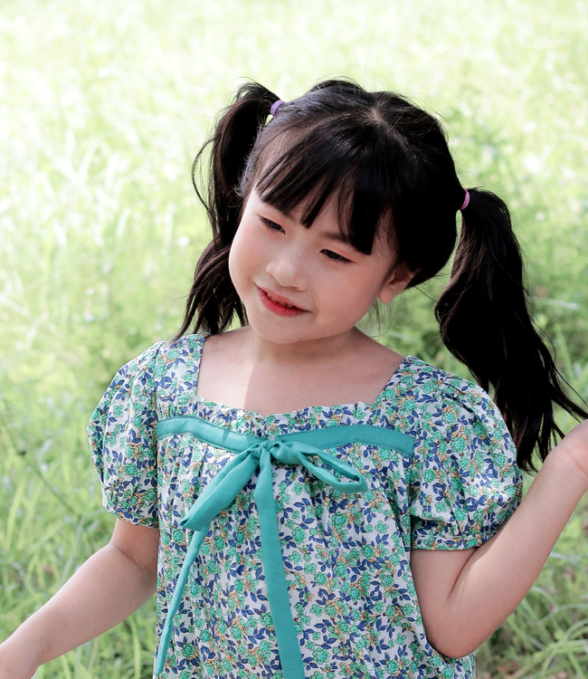 Váy hoa xanh nơ ngực