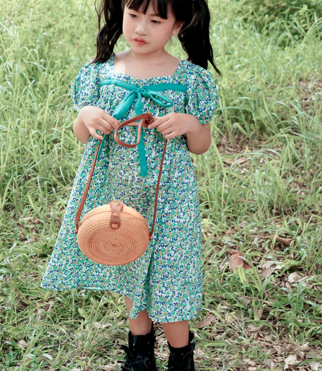 Váy hoa xanh nơ ngực