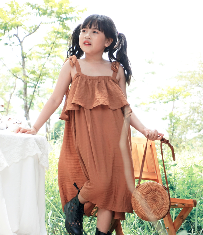 Váy nâu dây vai nơ bèo ngực 