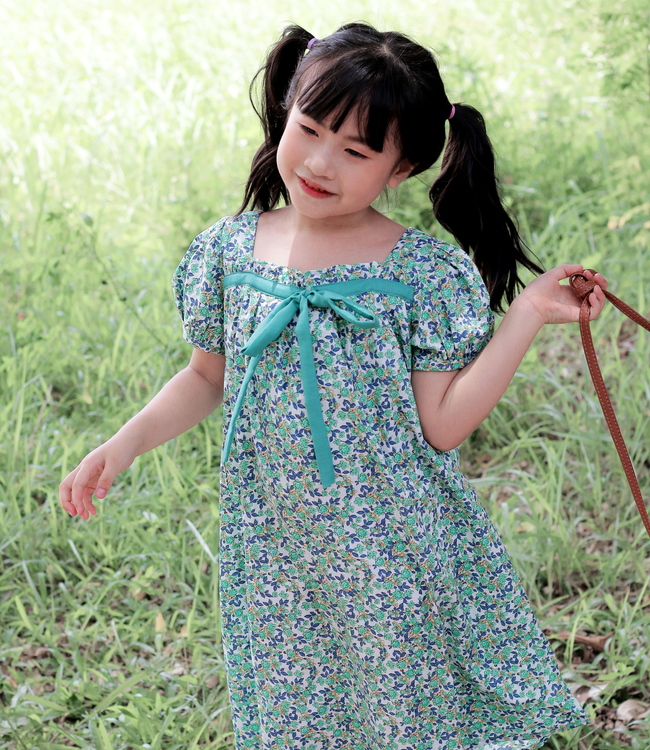 Váy hoa xanh nơ ngực