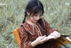 Váy hoa nâu cam lá cổ bèo